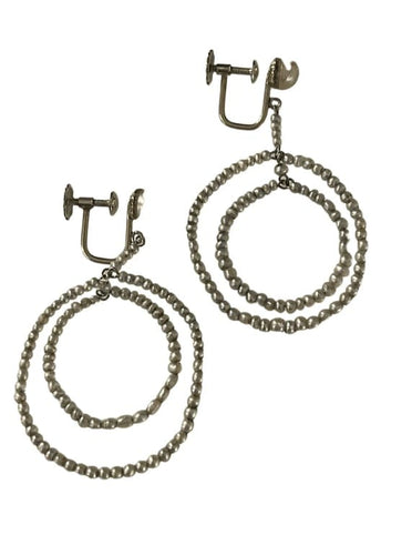 Boucles d'oreilles Boucles d’oreilles - Disques de perles fines en or gris 58 Facettes 896941