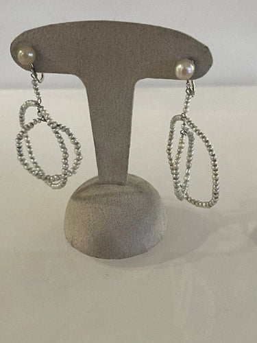 Boucles d'oreilles Boucles d’oreilles - Disques de perles fines en or gris 58 Facettes 896941