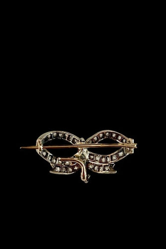 Broche Broche nœud Napoléon III en or et argent sertie de diamants 58 Facettes
