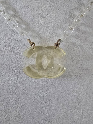 Collier Chanel Ice Cube - Collier vintage en métal doré et résine 58 Facettes