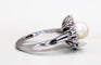 Bague 59 Bague marguerite en or blanc 18K avec perle et diamants 58 Facettes
