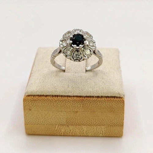 Bague 54 Bague marguerite en or blanc 18 carats, saphir et diamants 58 Facettes
