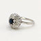 Bague 54 Bague marguerite en or blanc 18 carats, saphir et diamants 58 Facettes