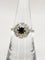 Bague 54 Bague marguerite en or blanc 18 carats, saphir et diamants 58 Facettes
