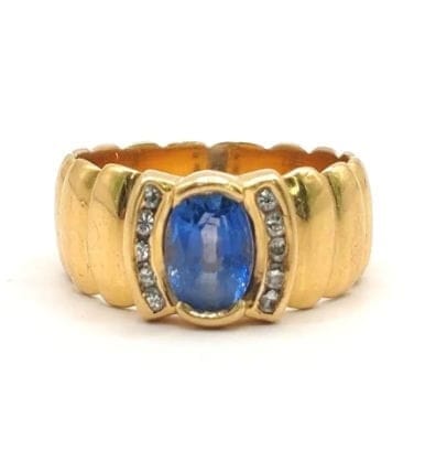 Bague 51 Bague godronnée vintage en or jaune 18K au saphir de Ceylan 58 Facettes