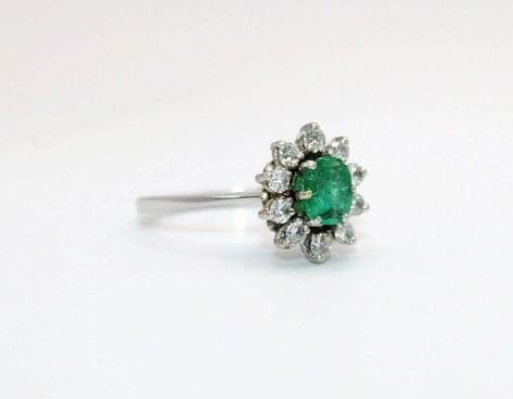 Bague Bague marguerite en or gris 18K à émeraude et diamants 58 Facettes