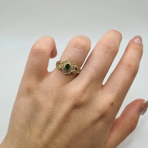 Bague 52 Bague en or jaune 18 carats sertie d’émeraudes et diamants 58 Facettes