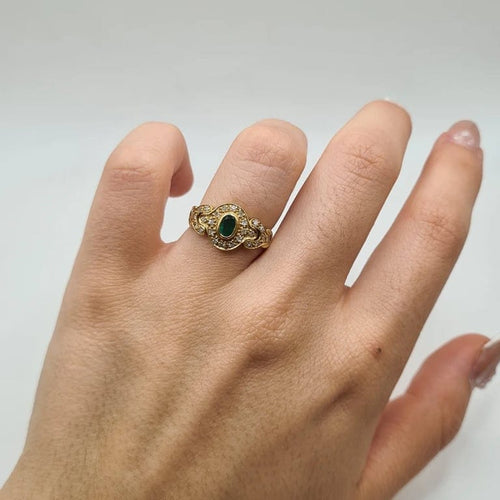 Bague 52 Bague en or jaune 18 carats sertie d’émeraudes et diamants 58 Facettes