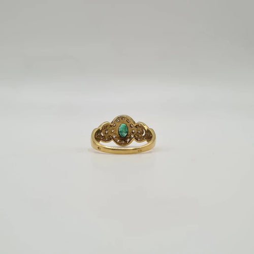 Bague 52 Bague en or jaune 18 carats sertie d’émeraudes et diamants 58 Facettes