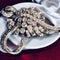 Broche Broche Art déco en or gris et platine, diamants 58 Facettes