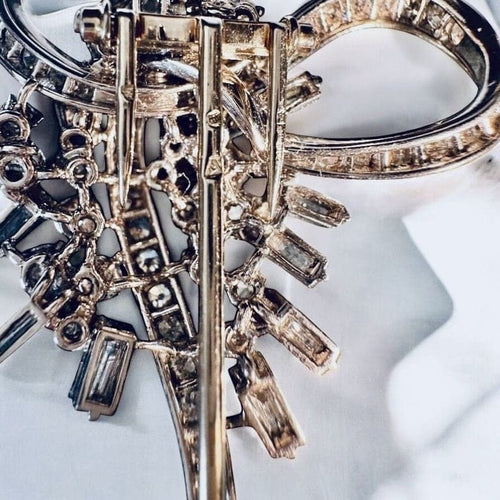 Broche Broche Art déco en or gris et platine, diamants 58 Facettes