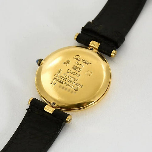 Montre Cartier Vendôme Must - Montre en argent plaqué or, cadran laqué noir 58 Facettes