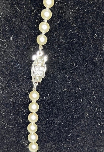 Collier Collier Art déco - Perles de culture, fermoir en or gris et diamants 55 cm 58 Facettes
