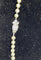 Collier Collier Art déco - Perles de culture, fermoir en or gris et diamants 55 cm 58 Facettes