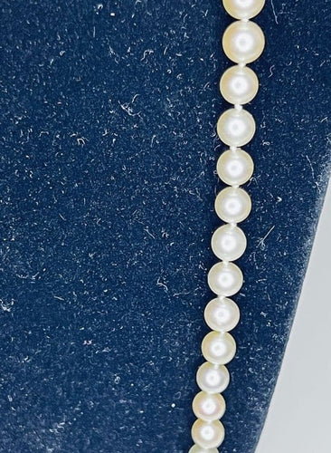 Collier Collier Art déco - Perles de culture, fermoir en or gris et diamants 55 cm 58 Facettes
