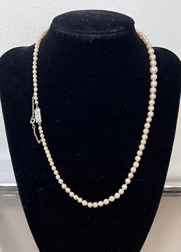 Collier Collier Art déco - Perles de culture en chute, fermoir en or gris et diamants 58 Facettes