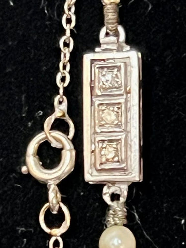 Collier Collier Art déco - Perles de culture en chute, fermoir en or gris et diamants 58 Facettes