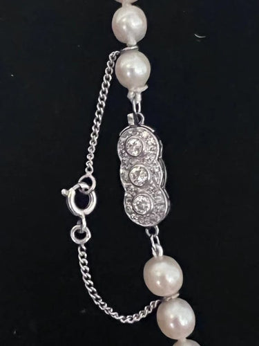 Collier Collier de perles de culture Akoya avec fermoir en or blanc et diamants 58 Facettes