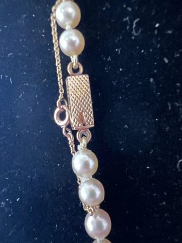 Collier Collier de perles de culture blanches 50 cm, fermoir en or jaune 58 Facettes