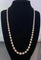 Collier Collier de perles de culture en or blanc 18k, 55,5 cm 58 Facettes