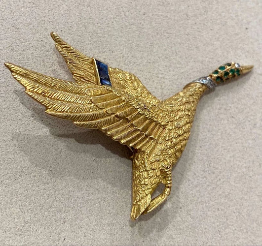 Broche Hermès - Broche canard en vol en or jaune et pierres précieuses 58 Facettes A_314_D