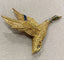 Broche Hermès - Broche canard en vol en or jaune et pierres précieuses 58 Facettes A_314_D