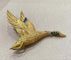 Broche Hermès - Broche canard en vol en or jaune et pierres précieuses 58 Facettes A_314_D