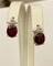 Boucles d'oreilles Boucles d’oreilles puces en or blanc 18 carats, rubis et diamants 58 Facettes