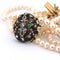 Collier Collier de perles - Fermoir en or 18 carats et argent, diamants et émeraudes 58 Facettes CL93 '(5269)
