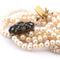 Collier Collier de perles - Fermoir en or 18 carats et argent, diamants et émeraudes 58 Facettes CL93 '(5269)