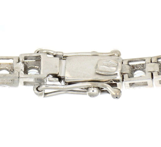 Bracelet Bracelet tennis en or blanc 18 carats et diamants 58 Facettes