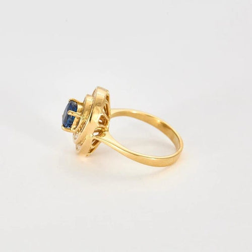 Bague 52 Bague tourbillon en or jaune 18 carats, saphir de Ceylan et diamants 58 Facettes 1-0000109/15