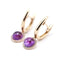 Boucles d'oreilles Boucles d’oreilles cabochon en or jaune 18 carats, améthystes et diamants 58 Facettes UKA000092FV