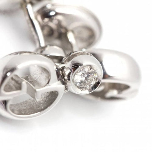 Boucles d'oreilles Gucci 1973 - Boucles d'oreilles en or blanc 18 carats et diamants 58 Facettes D360464FJ
