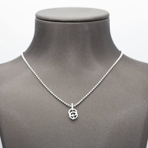 Collier Gucci - Collier motif GG en or blanc 18 kt et diamants 58 Facettes D360497FJ
