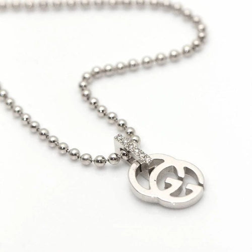 Collier Gucci - Collier motif GG en or blanc 18 kt et diamants 58 Facettes D360497FJ