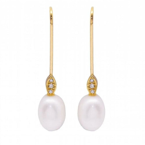 Boucles d'oreilles Boucles d'oreilles perles ovales et diamants en or jaune 18 carats 58 Facettes D360904FV