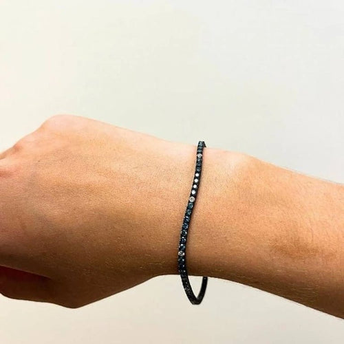 Bracelet Bracelet rivière en or blanc 18 ct et diamants bleus et blancs 58 Facettes D363133CG