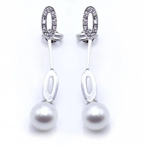 Boucles d'oreilles Boucles d'oreilles longues en or blanc, diamants et perles 58 Facettes N102863LF