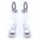 Boucles d'oreilles Boucles d'oreilles longues en or blanc, diamants et perles 58 Facettes N102863LF