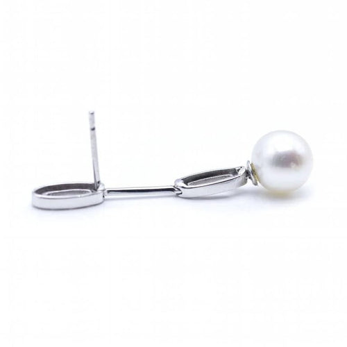 Boucles d'oreilles Boucles d'oreilles longues en or blanc, diamants et perles 58 Facettes N102863LF