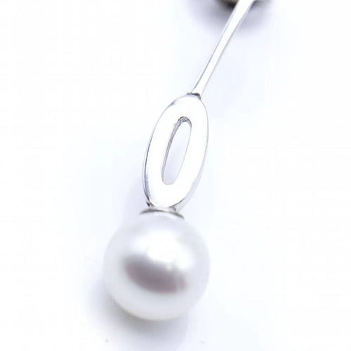 Boucles d'oreilles Boucles d'oreilles longues en or blanc, diamants et perles 58 Facettes N102863LF