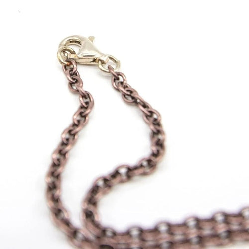 Collier Collier croix - Pendentif en or blanc, argent et topazes bleues 58 Facettes D363906SO