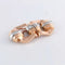 Boucles d'oreilles Double clip - Broche en or rose, or jaune et platine 18 ct, diamants 58 Facettes 1