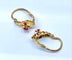 Boucles d'oreilles Boucles d’oreilles dormeuses en or jaune 18 carats et pierres rouges 58 Facettes AB677