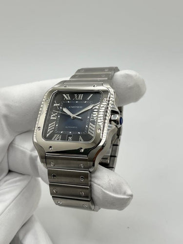 Montre Cartier Santos - Montre automatique acier, cadran bleu 58 Facettes 1635