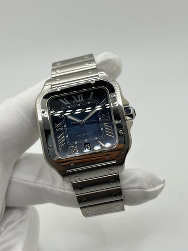 Montre Cartier Santos - Montre automatique acier, cadran bleu 58 Facettes 1635