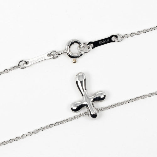 Pendentif Tiffany & Co. - Pendentif croix en platine 58 Facettes b6k4ns