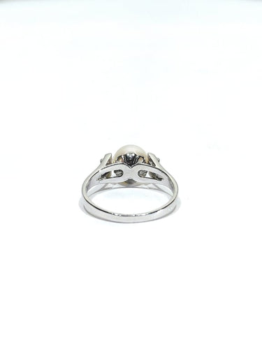 Bague 53 Bague en or blanc 18 carats avec perle et diamants 58 Facettes 1714229