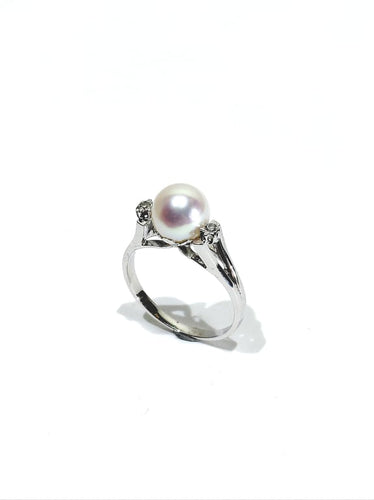 Bague 53 Bague en or blanc 18 carats avec perle et diamants 58 Facettes 1714229